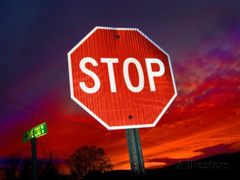 john-churchman-stop-sign-with-an-intense-red-sunset-in-the-backround.jpg
